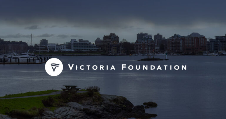 Victoria Foundation logo rests on top of harbour view.